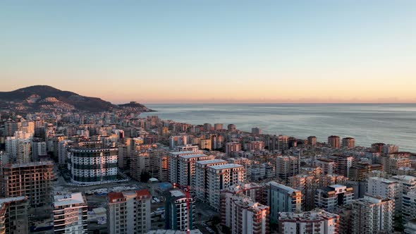 Colorful sunset over the city Aerial View 4 K Alanya Turkey