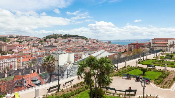 Timelapse of Lisbon rooftop from Sao Pedro de Alcantara viewpoint - Miradouro in Portugal - UHD