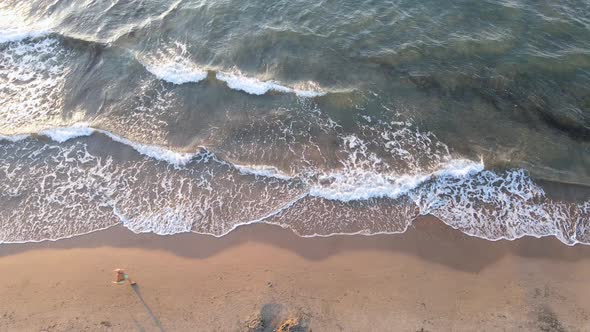 Slow motion shot of senior man jogging at beach