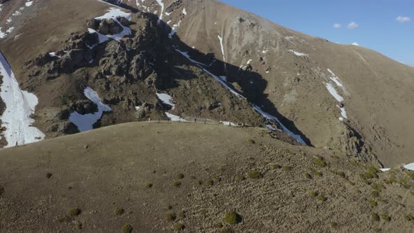  Tourists Walking Along the Ridge of the Khodyuk Pass