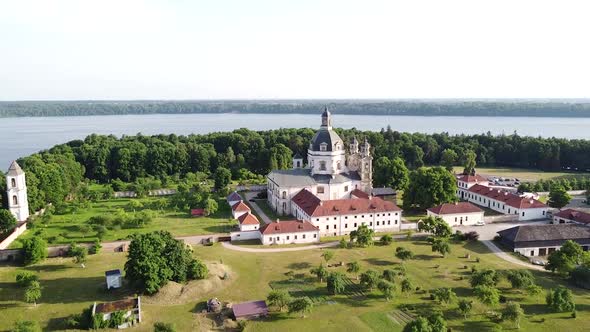 Pazaislis monastery complex building with majestic dome in fly away aerial view