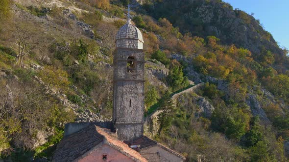 Aerial Shot of the Christian Church on a Way to the Top of the Mountain Where St