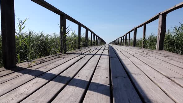 Wooden Bridge with Railings. Dolly Shot