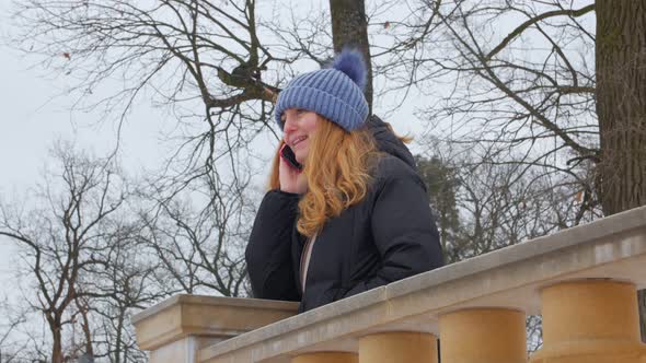 Happy Woman Talking On The Phone