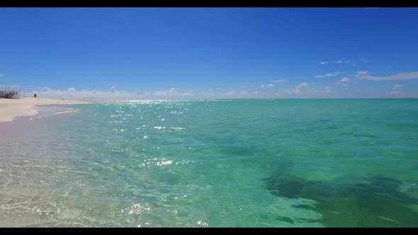 Aerial above nature of beautiful sea view beach holiday by shallow ocean with white sandy background