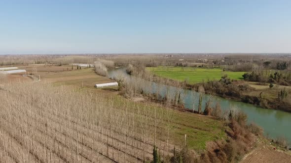 Aerial View Farm Field By The River 4K