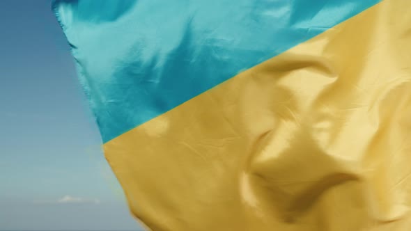 Flag of Ukraine Flying in the Sky