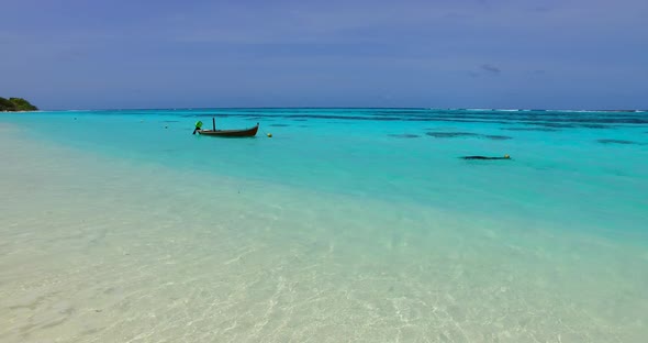 Wide drone abstract shot of a paradise sunny white sand beach and blue ocean background in high reso