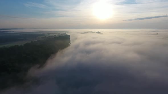 Flight Over the River in the Fog at Dawn