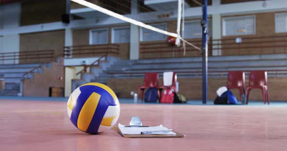 Volleyball and clipboard in the court 4k