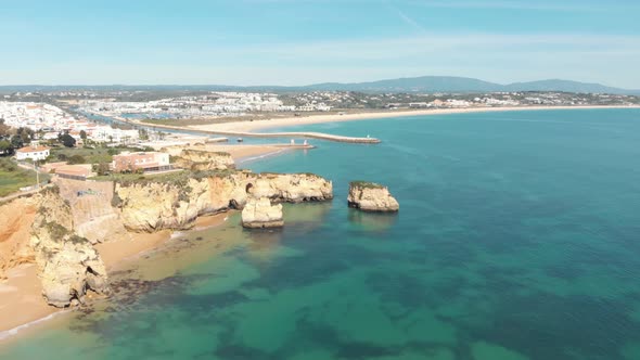 Mouth of Ribeira de Bensafrim, Lagos, Algarve. Aerial forward