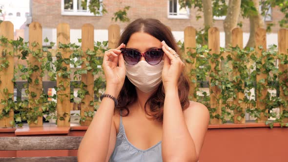 Tourist Using Medical Mask Protection to Protect Herself From Coronavirus and Covid19 During Travel