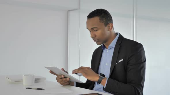 Man Paying Online Online Shopping with Credit Card on Tablet