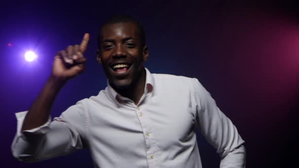 African-American Man Dancing and Gesturing with His Hands, Close-up