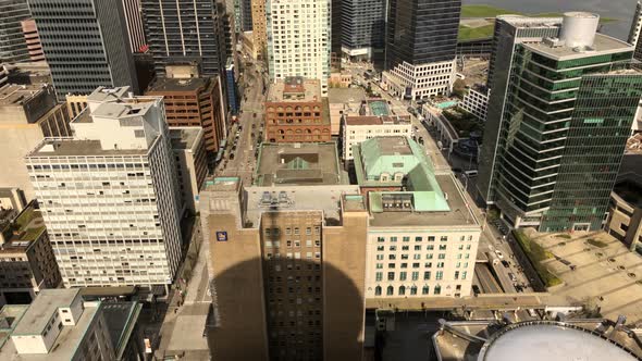 Aerial Time lapse of Vancouver downtown area near harbour tower on sunny day