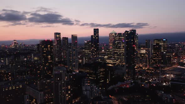 Ascending Footage of Skyscrapers in Canary Wharf Business Centre at Dusk