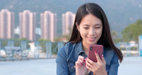 Woman use of smart phone at outdoor