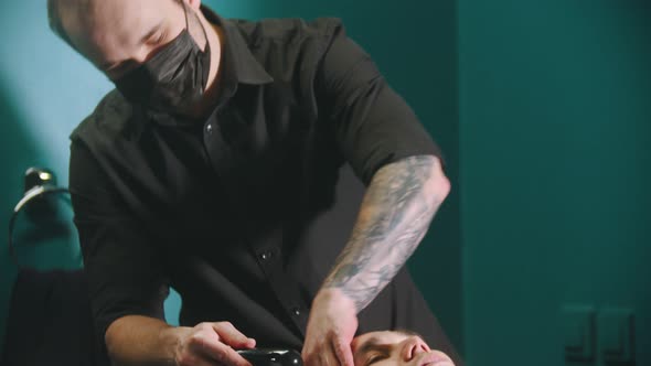 Man Barber Washing His Client Hair