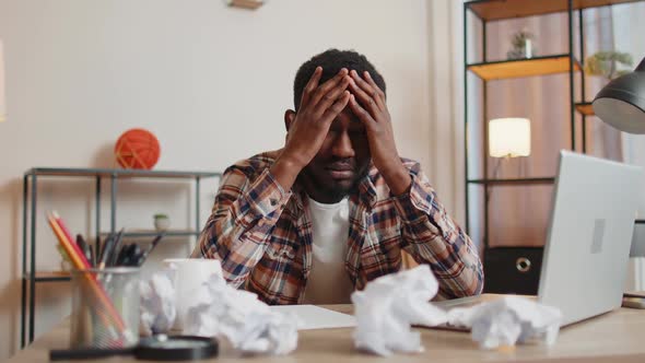 Angry Furious Man Working at Home Office Throwing Crumpled Paper Having Nervous Breakdown at Work