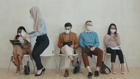 Diverse Group of Job Applicants in Face Masks