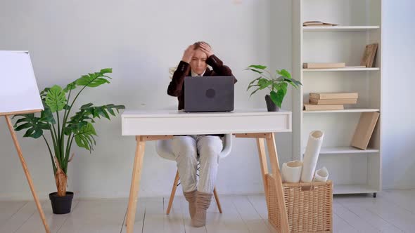 Woman at Work Space Video Conference