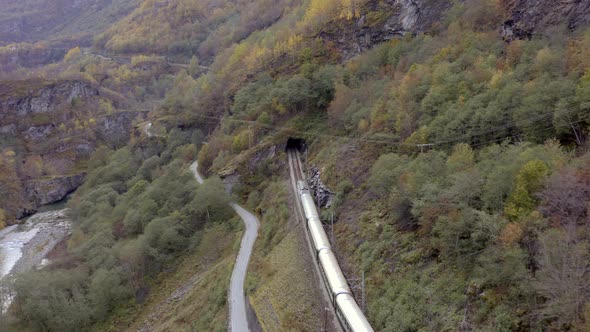 The Flam to Myrdal Train Passing Through Beautiful Landscapes