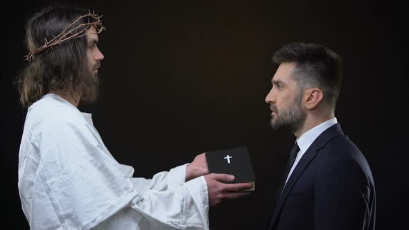 Jesus Christ Giving Bible to Businessman, Moral Values, Religious Kindness