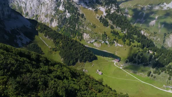 aerial view over massive mountain valley in the swiss alpstein, beautiful mountain range