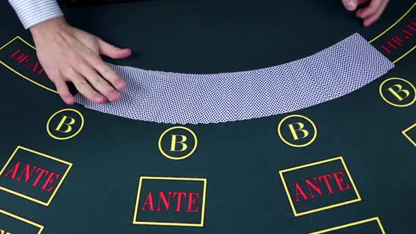 Croupier Dealing Cards in a Poker Game Table, Slow Motion