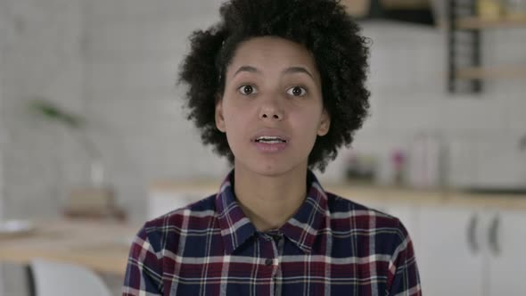 Portrait of African American Woman Saying Yes with Head Sign