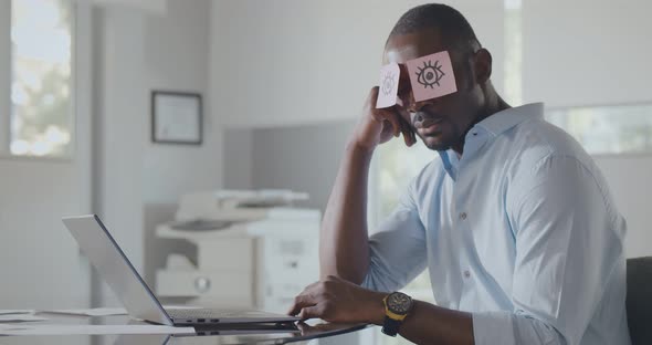 Tired Sleepy Black Businessman with Stickers on Eyes Sleeping at Workplace