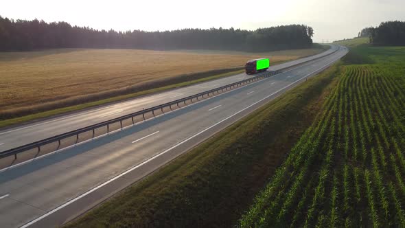 Truck with green screen and trackink markers on trailer