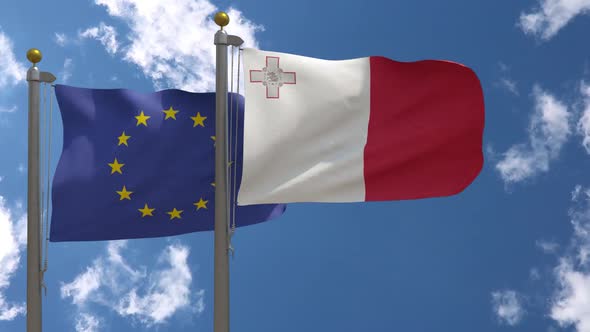 European Union Flag Vs Malta Flag On Flagpole