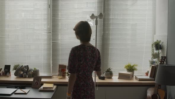 Girl Looking out Window in Ward