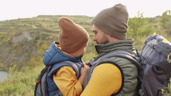 Father and Little Son on Hike