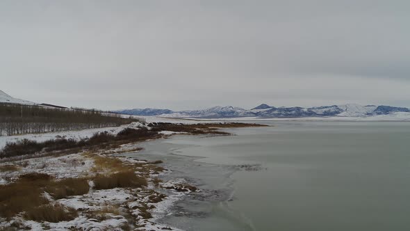 Ice forms along the shoreline of the south end of Utah Lake near Lincoln Beach, looking toward the w