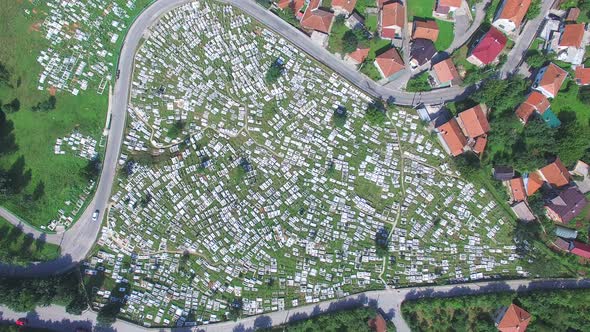 Flying over Bosnian graveyard