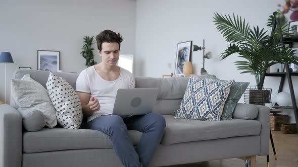 Loss, Frustrated Man Working on Laptop