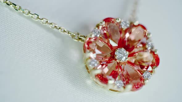 Ruby and Diamond Flower Pendant on Luxury Shop Display