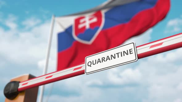 Opening Boom Barrier with QUARANTINE Sign at the Slovak Flag