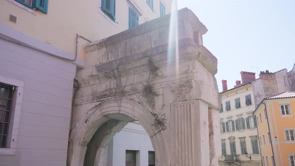 Old Arch of Riccardo in Center of Town Attracts Tourists