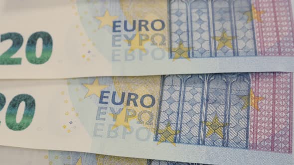 Paper Euro twenty denominations money in a row close-up 4K 2160p 30fps UHD tilting footage - Europea