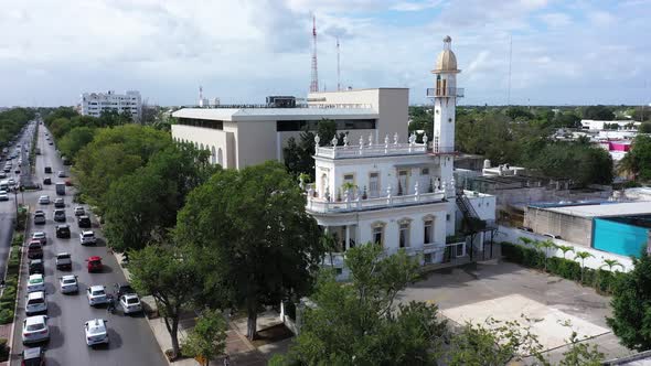 Aerial closeup push in to the el Minaret mansion on the Paseo de Montejo in Merida, Yucatan, Mexico.