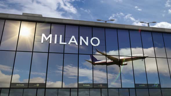 Airplane landing at Milan Italy airport mirrored in terminal