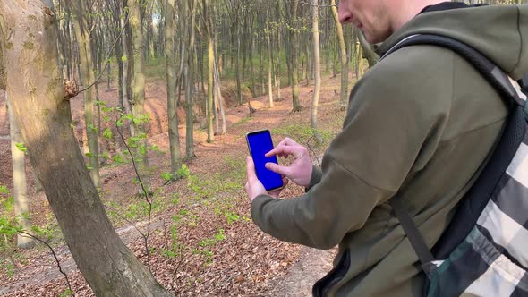 White Man Touching Blue Chroma Key Blank Screen Zooming Map Outdoors