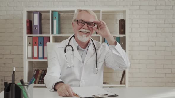 Portrait Mature Doctor Wearing Glasses Confident Serious Senior Therapist Practitioner Gp Wearing