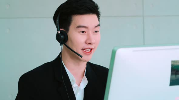 Business People Wearing Headset Working in Office