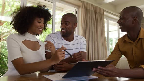 Mixed race couple buying their house