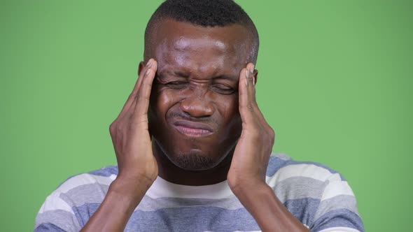 Young African Man Having Headache