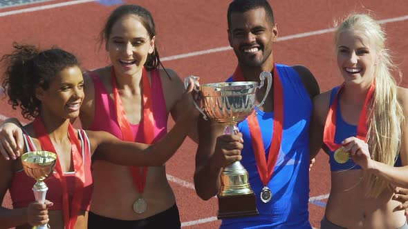 Representatives of National Sports Team Showing to Their Fans Trophies They Won